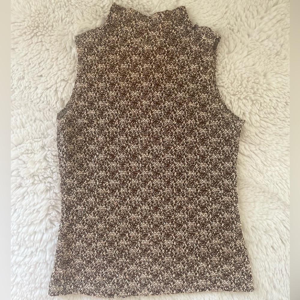 Brown and Tan 
Size is medium